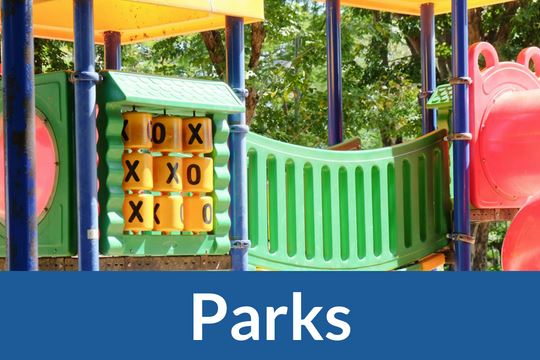 "Parks" graphic icon with image of playground equipment